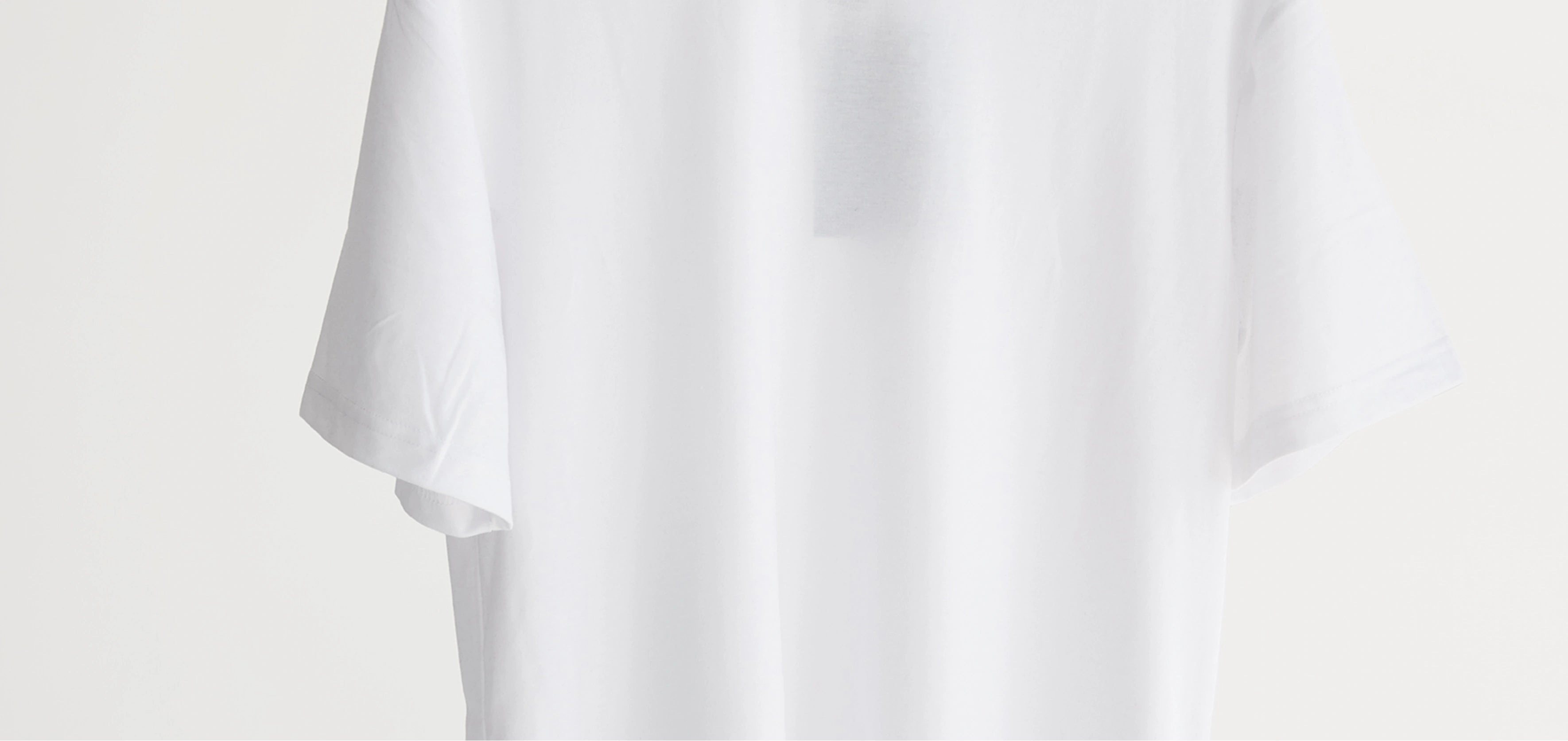 White t-shirt on a light gray background